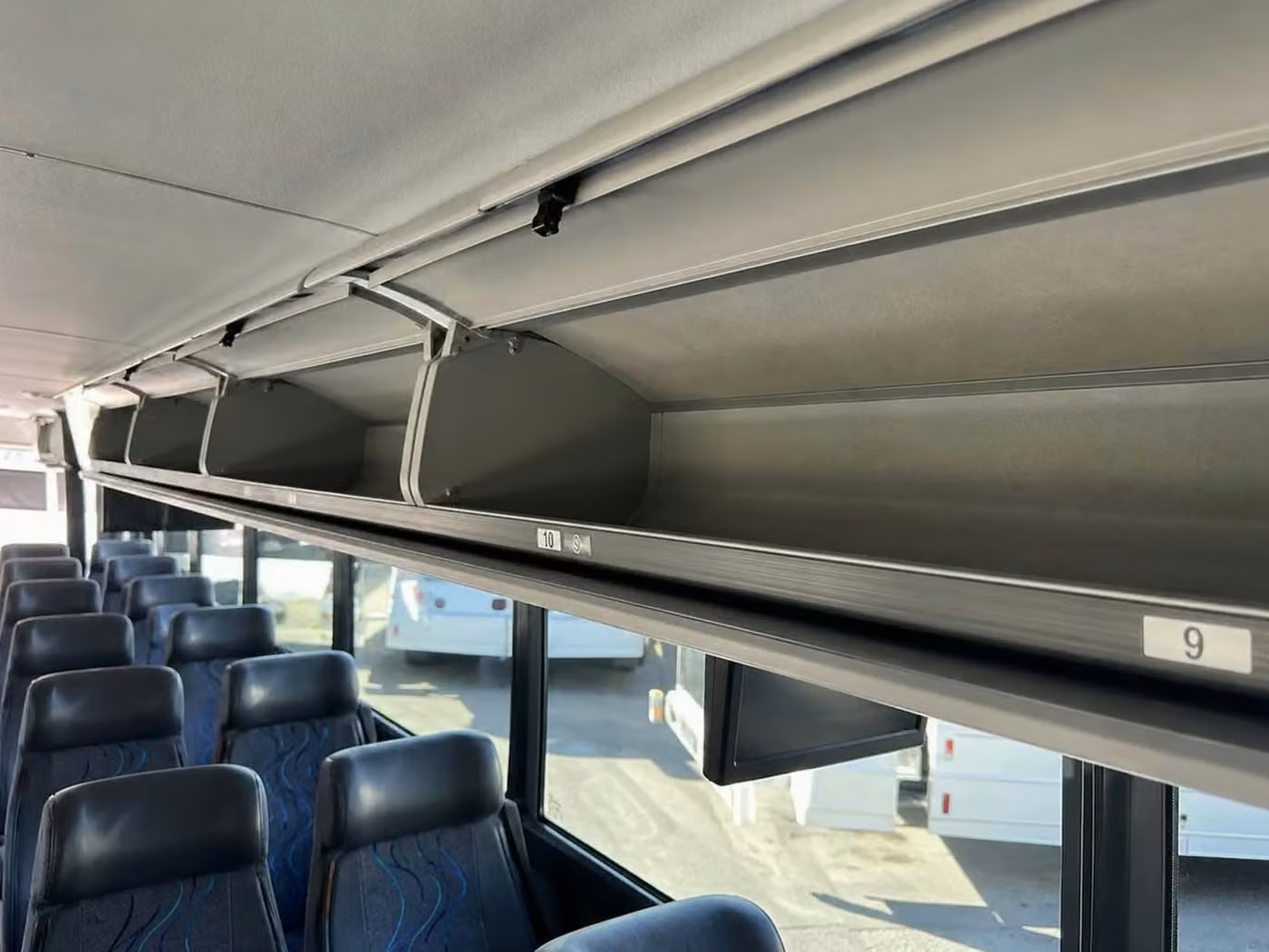 pine bluff 18 passenger minibus overhead storage