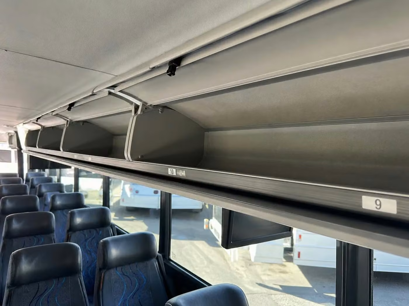 pine bluff 25 passenger minibus overhead storage