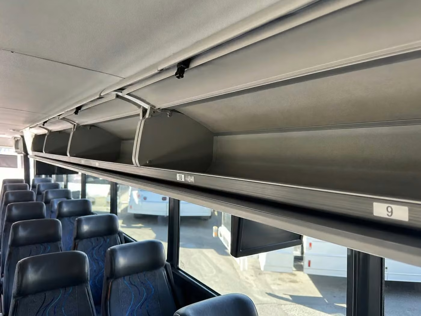 pine bluff 28 passenger minibus overhead storage