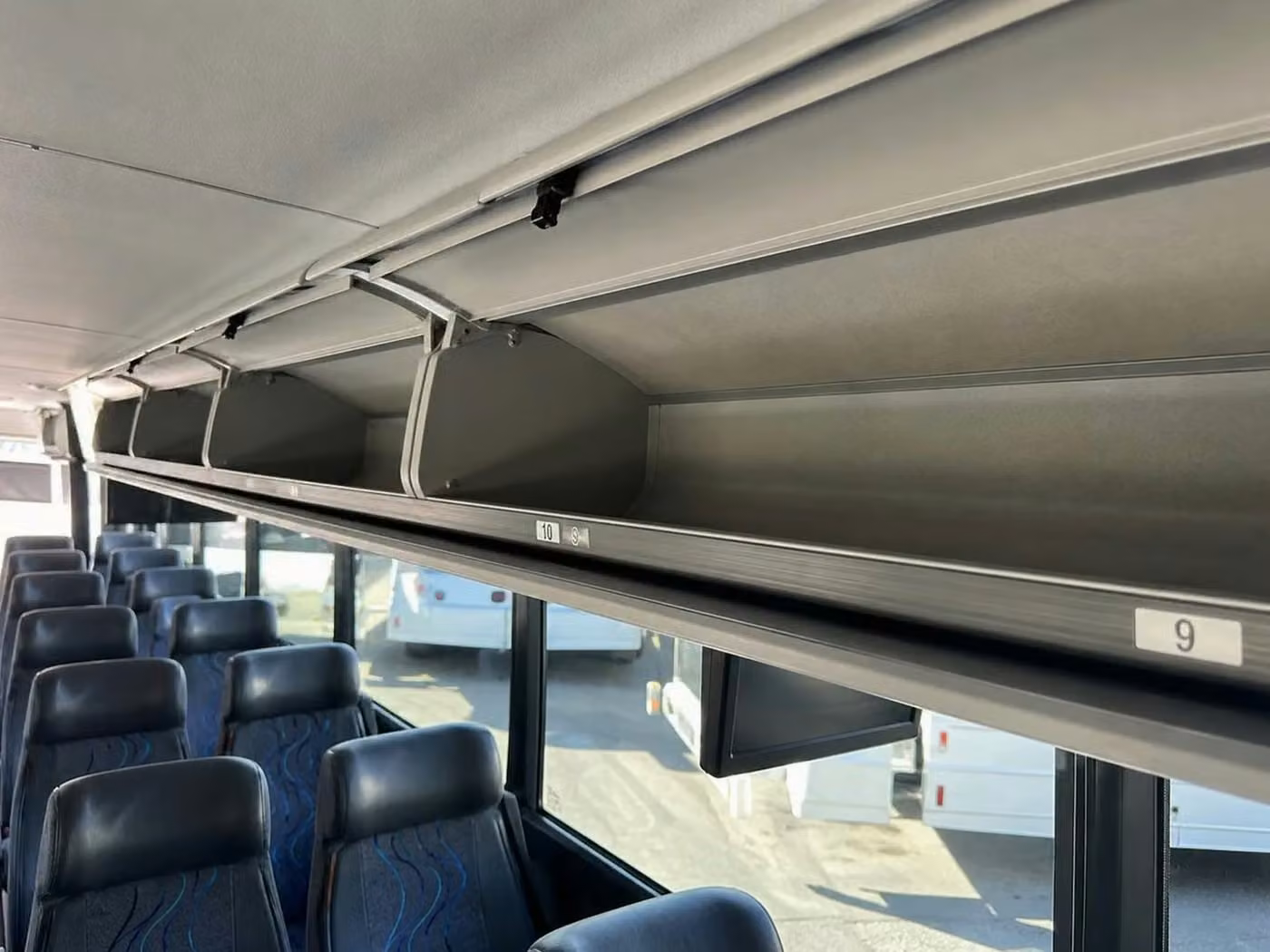 pine bluff 35 passenger minibus overhead storage