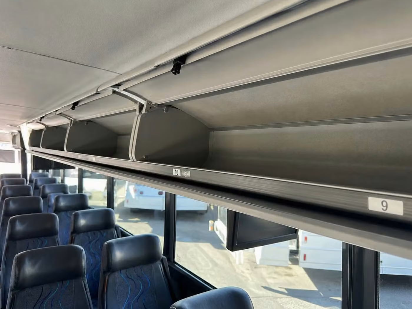 pine bluff 56 passenger charter bus overhead storage