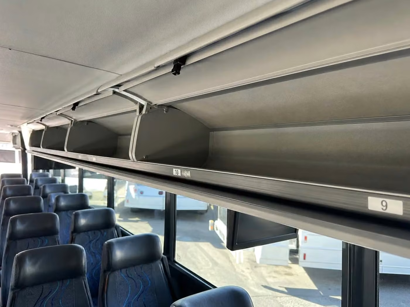 pine bluff charter bus overhead storage